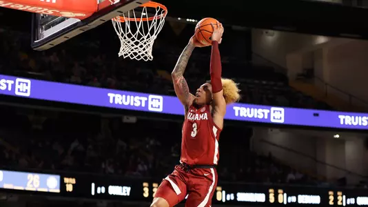 JD Davison Dunks the ball