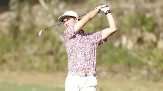 Thomas Ponder long iron in fairway