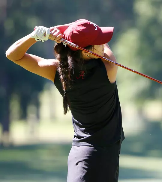 Emma Talley swinging the golf club