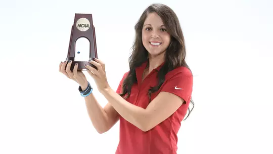 Emma Talley holding the National Championship trophy