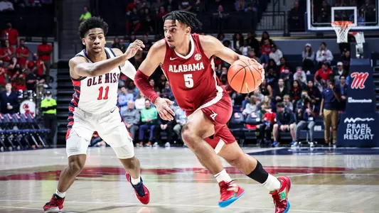 Jaden Shackelford dribbles past an Ole Miss defender