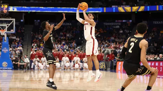 Jaden Shackelford shoots a three pointer against Vanderbilt