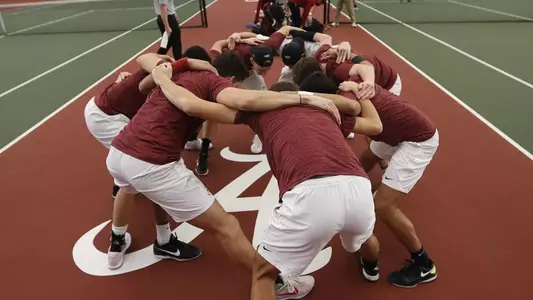 Men's Tennis huddle
