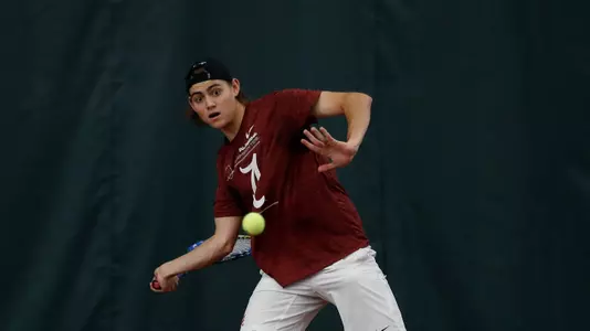 Zach Foster hits the ball