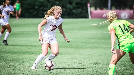 Riley Mattingly trying to get the ball past an opponent