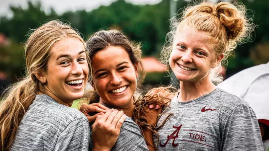Riley Mattingly posting with her teammates