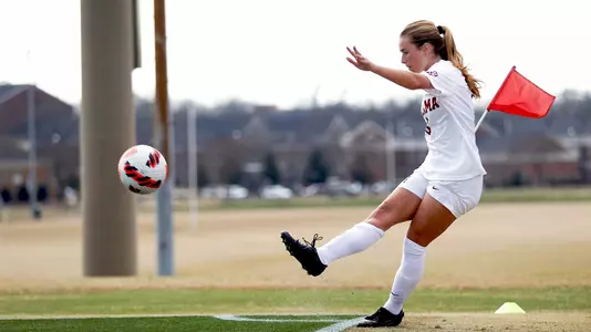 Felicia Knox takes a corner kick