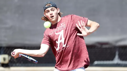 Zach Foster hits the ball