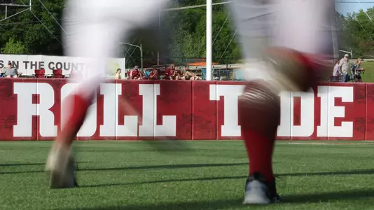 Softball players running pregame