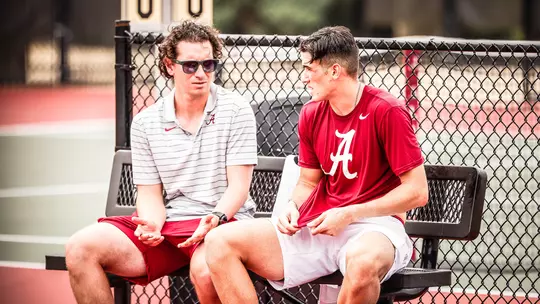Juan Martin sitting with Ezequiel Gils