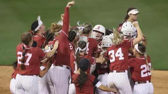 Alabama softball celebrates the walk-off win vs. Mississippi State