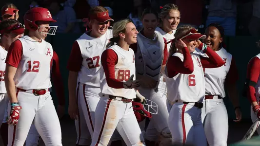 Jenna Johnson celebrates a home run vs. Georgia