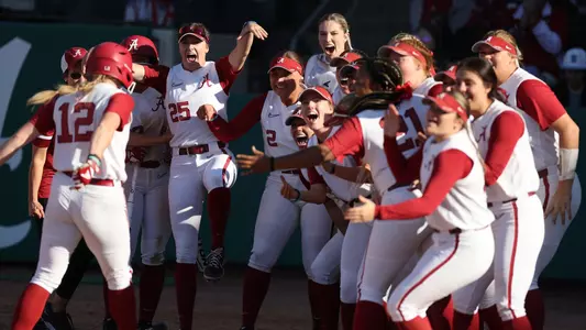 Alabama softball team celebrating a home run