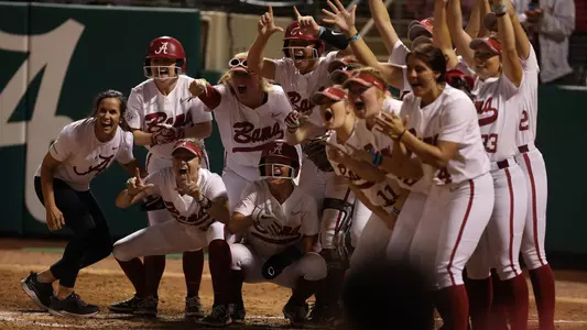 Alabama softball celebrating a home run