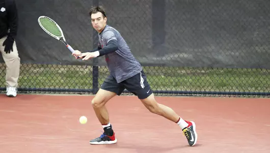 Planinsek Hits a serve