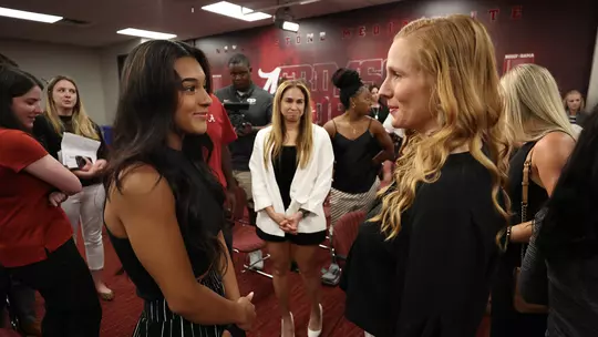 Ashley Johnston speaking to Luisa Blanco at the press conference