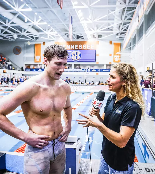 Derek Maas talking to a reporter