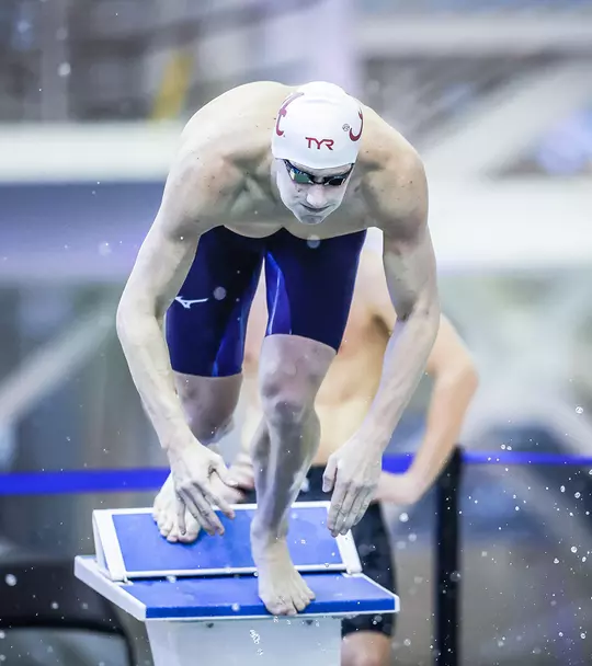 Derek Maas diving into the water to start his event