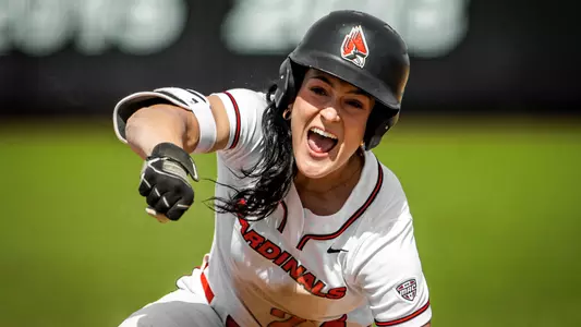 Faith Hensley celebrates a base hit