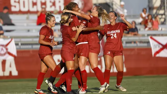Team Celebrates after scoring a goal