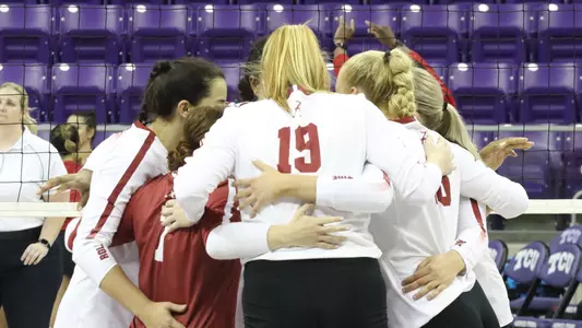 Volleyball team huddle vs. Louisiana