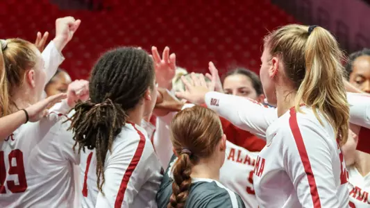 Volleyball team huddle vs. Oregon State
