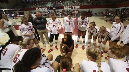 Volleyball team huddle during a timeout