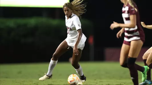 Gianna Paul dribbes the ball