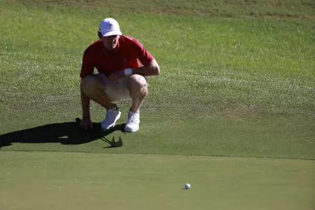 Alabama Golfer Nick Dunlap lines up his put at the The Jerry Pate SEC Match Play at Old Overton in Birmingham, AL on Tuesday, Sep 27, 2022.