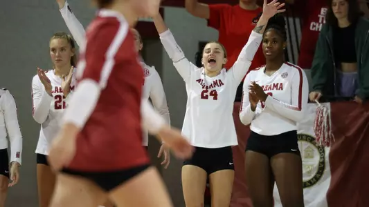 Volleyball player Dru Kuck celebrating a point.
