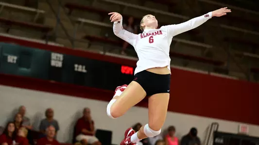 Alabama volleyball player Abby Marjama serves the ball.
