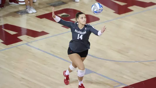 Alabama volleyball player Taylor Drapp serving the ball.