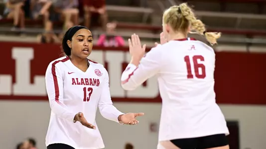 Alyiah Wells and Brooke Slusser High Five