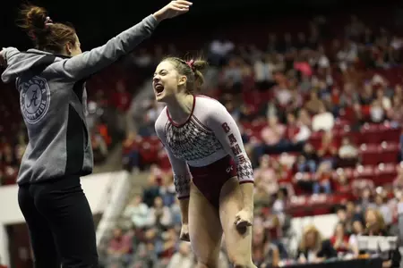 Gabby Gladieux celebrates on floor