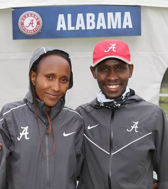 Mercy Chelangat posing with her brother Vincent Kiprop