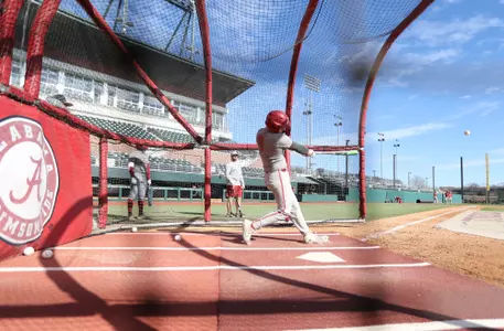 Alabama baseball player Mac Guscette (9) hits the ball during practice at Sewell-Thomas Stadium in Tuscaloosa, AL on Friday, Jan 27, 2023.