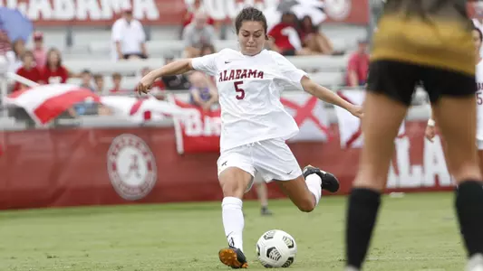 Bella Scaturro kicking the ball