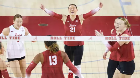 Francesca Bertucci celebrates with her teammates after a point vs. Missouri (Oct. 11, 2023)