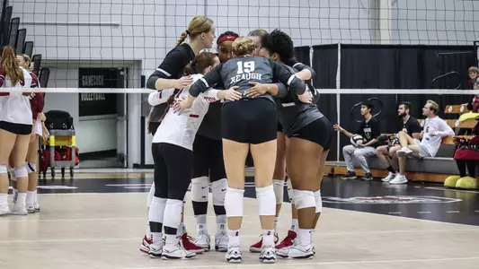 Alabama volleyball players huddle together vs. South Carolina (Oct. 18, 2023)