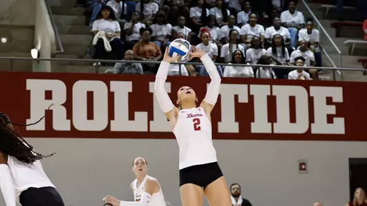 Callie Kieffer setting the ball.