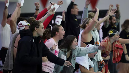 Team cheering against Mizzou at Don Gambril Olympic Pool in Tuscaloosa, AL on Friday, Oct 20, 2023.
