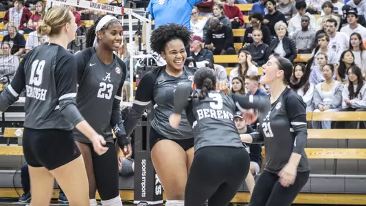 Alabama volleyball player Gabbi LeBlanc celebrates with her teammates after a point vs. South Carolina (Oct. 18, 2023)