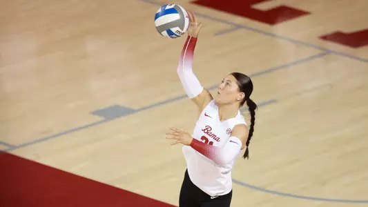 Francesca Bertucci serves the ball.