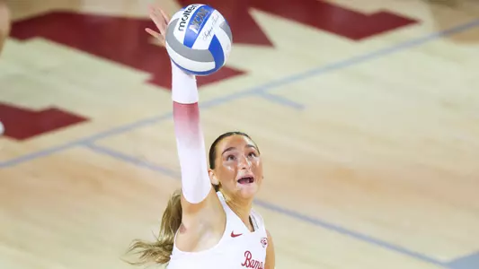 Callie Kieffer serves the ball.