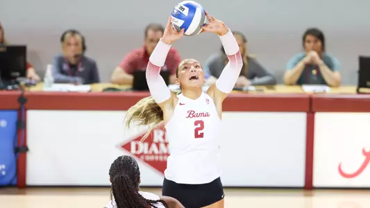 Callie Kieffer sets the ball to one of her teammates.