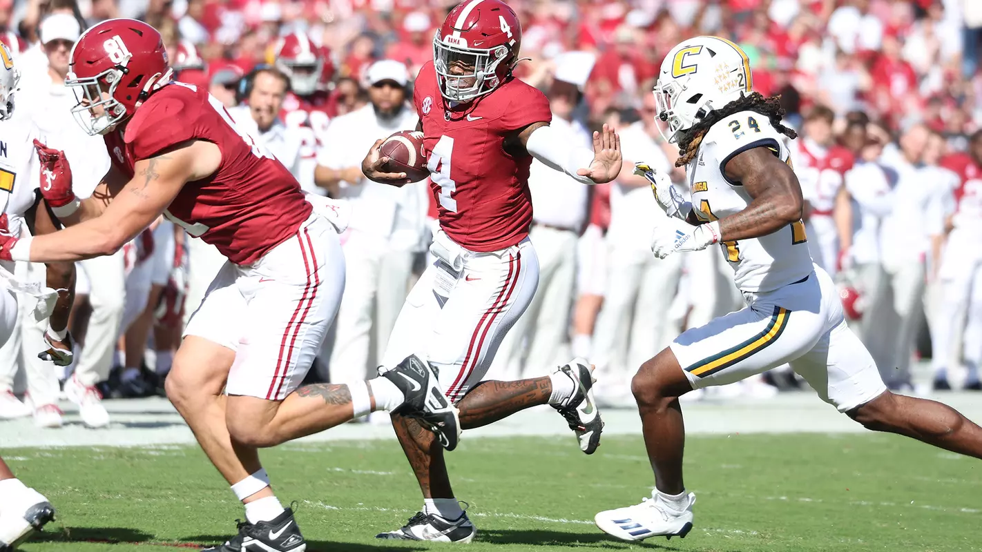 Alabama quarterback Jalen Milroe (4) runs the ball against UTC at Bryant-Denny Stadium in Tuscaloosa, AL on Saturday, Nov 18, 2023.