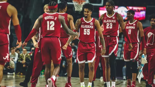 Men's Basketball Shaking Hands vs. Purdue