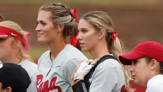 Montana Fouts and Ally Shipman stand together pregame