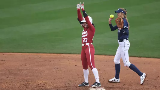 Faith Hensley celebrates after a base hit vs. Georgia Southern (Feb. 11, 2023)