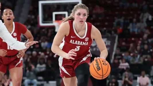 Barker dribbles the ball